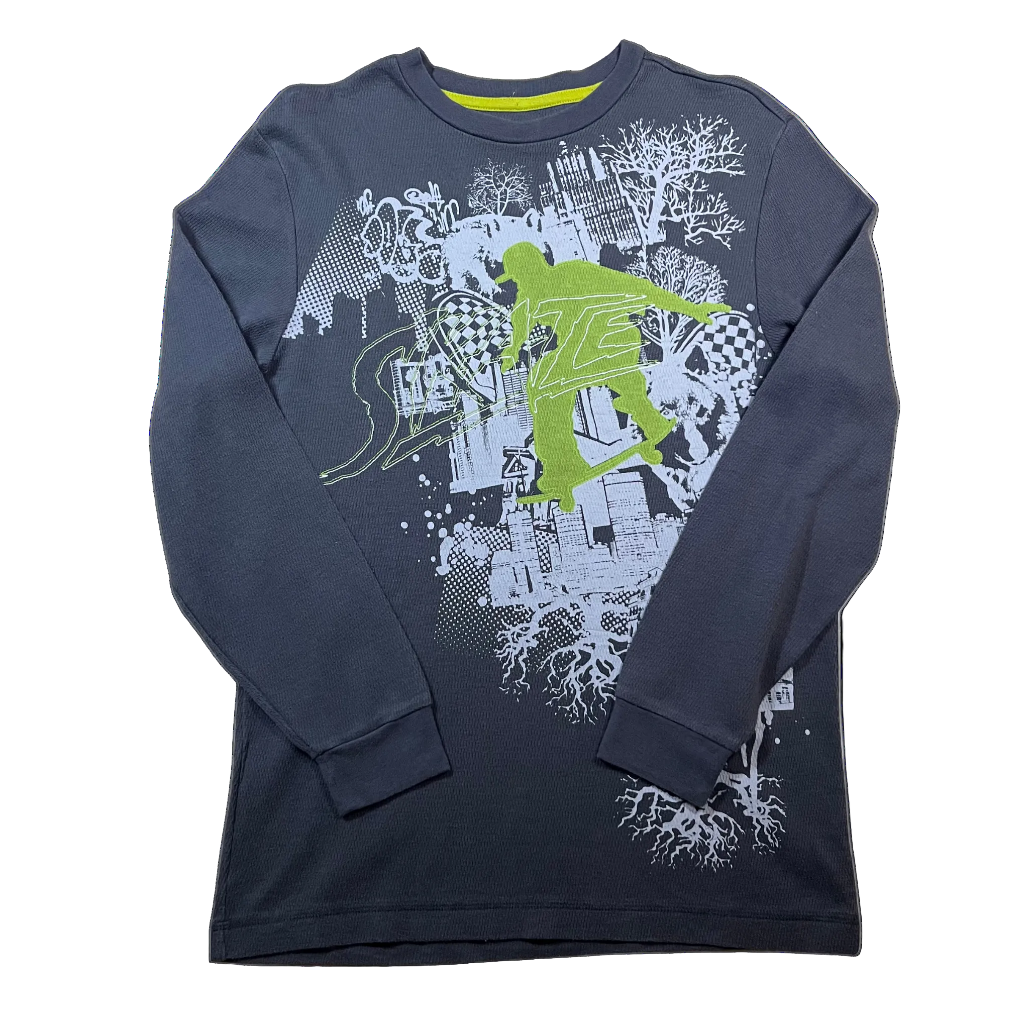 Flat-lay product photo of a vintage charcoal grey Old Navy waffle-knit long sleeve thermal shirt featuring a bright neon green and white Y2K skater graphic with graffiti text elements, checkerboards, and urban city root details.
